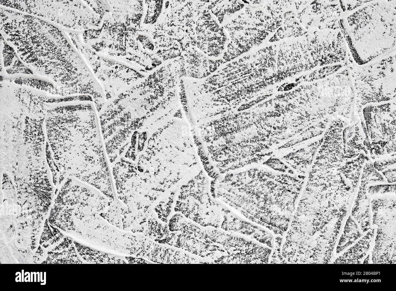 Gray grooved stucco on wall. Plaster patterned texture or background. Closeup Stock Photo