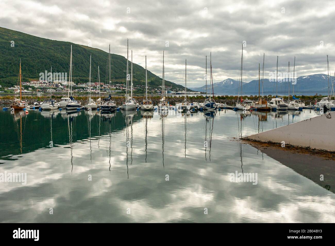 sailboats moored at the tourist port of Tromsø Stock Photo