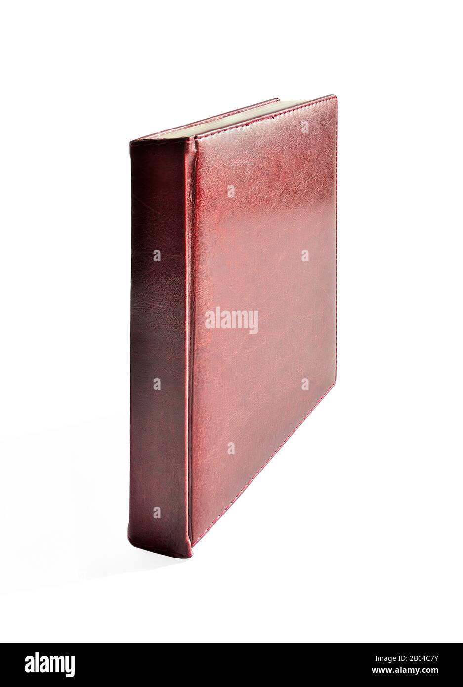 Upright red leather hardcover diary isolated on a white background. Office Stationery - daily planner for plan timetable, appointment, organization, m Stock Photo