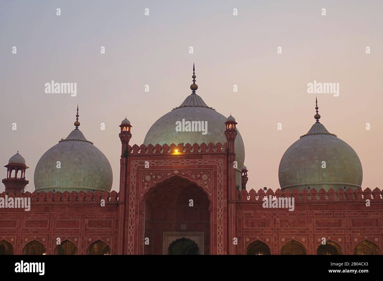 Domes of Muhgal Badshahi mosque in a clear evening, Lahore Pakistan 2019 Stock Photo