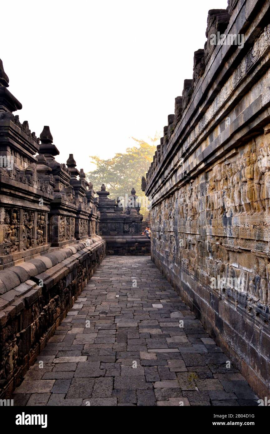 Dawn view of the Borobudur bas-relief, Buddhist temple in Java Stock ...