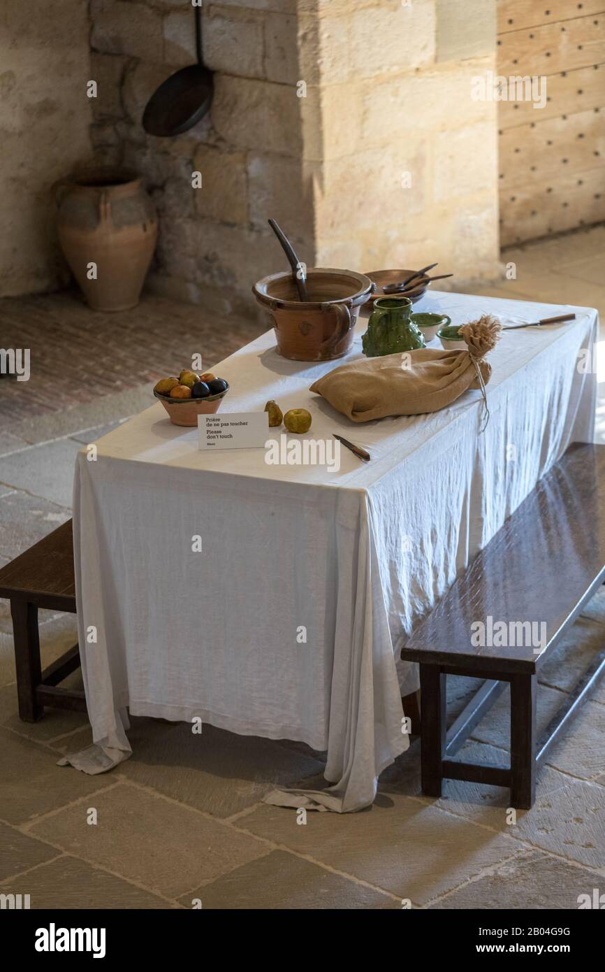 Castelnaud, Dordogne, France - September 7, 2018: Atique interior of the kitchen in Castelnaud Castle, medieval fortress at Castelnaud-la-Chapelle, Do Stock Photo