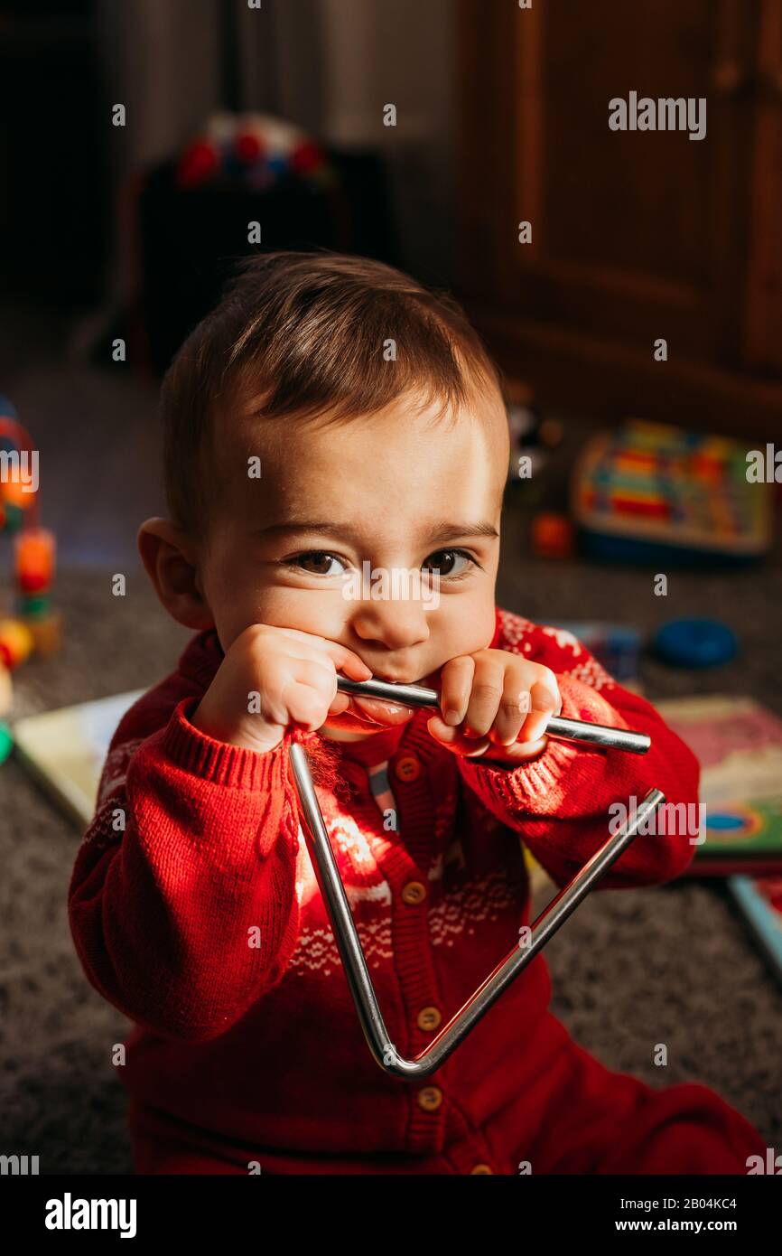 Triangle instrument hi-res stock photography and images - Alamy