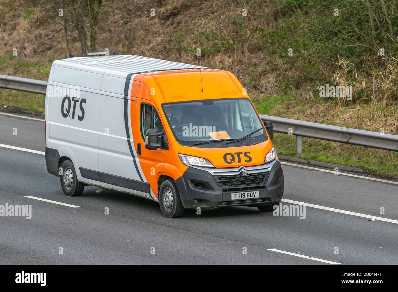 QTS Group van; UK's leading Rail Contractor; Haulage delivery trucks, HGV lorry, transportation, truck, vehicle, transport industry, M61 at Manchester, UK Stock Photo