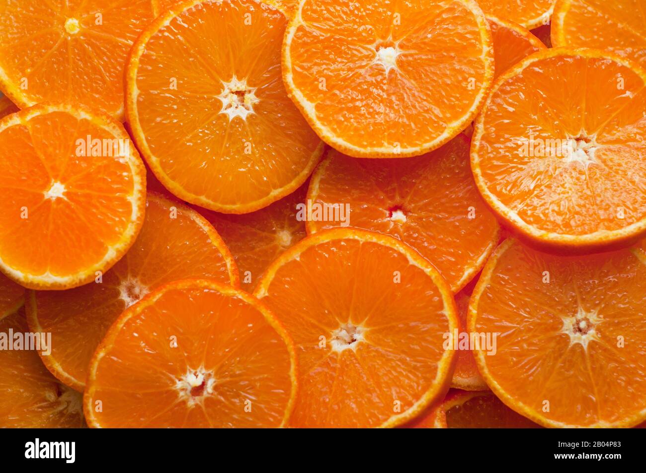 Fresh juicy sweet orange - citrus background. Ripe fruits. Healthy food. Stock Photo