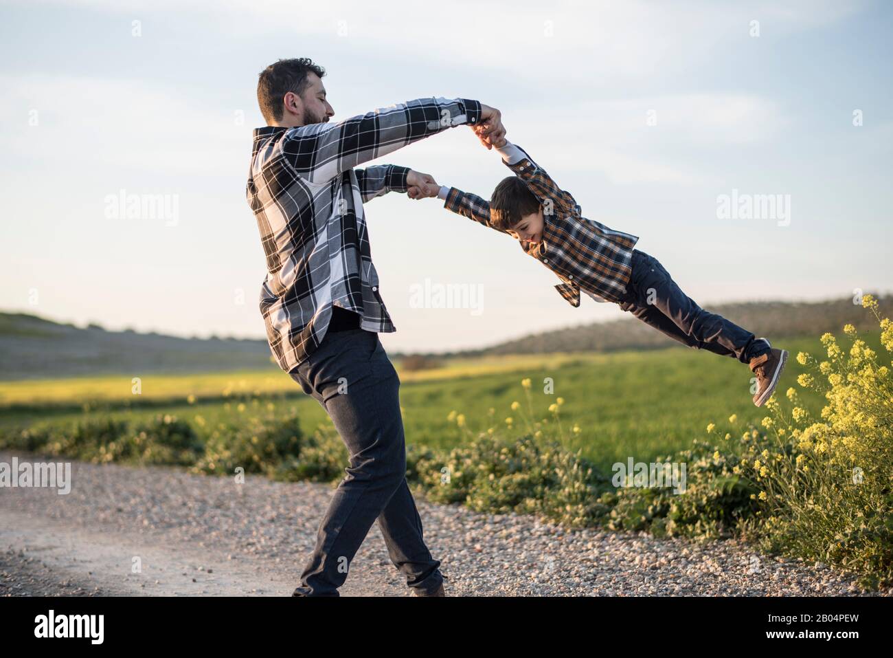 Child grabbing leg hi-res stock photography and images - Alamy