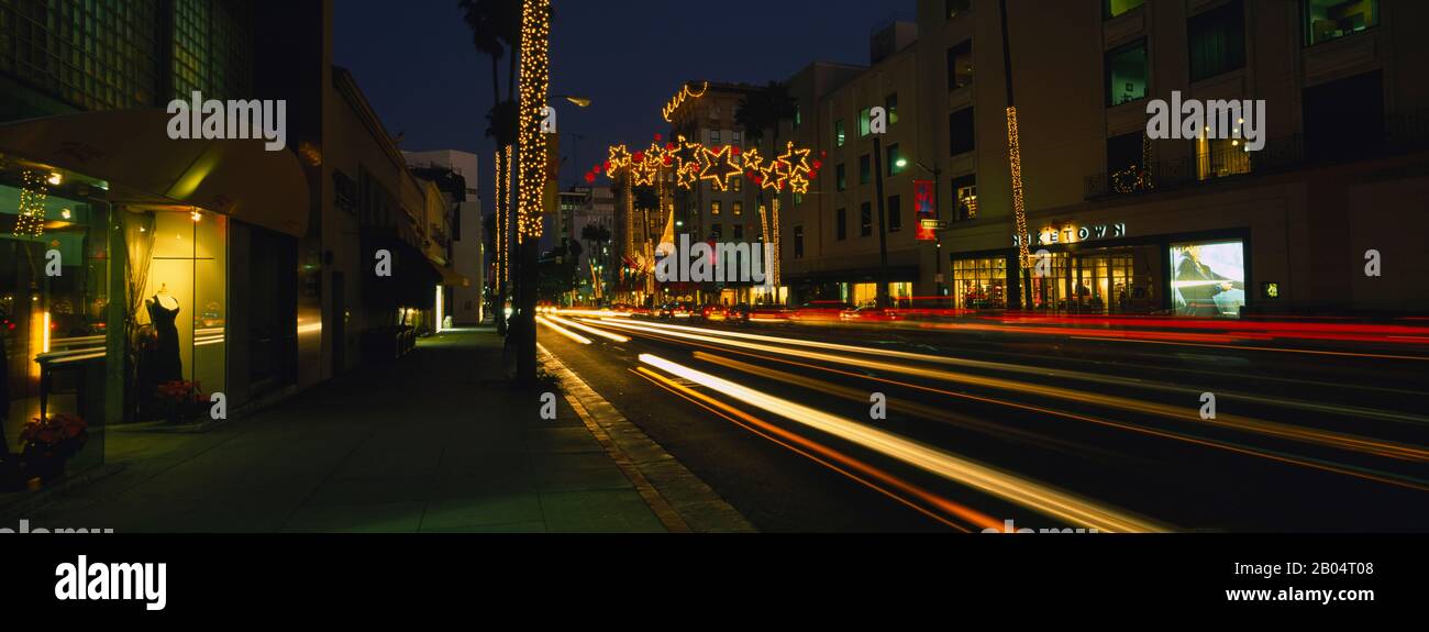 Tail lights of vehicles at night, Rodeo Drive, Beverly Hills, California, USA Stock Photo