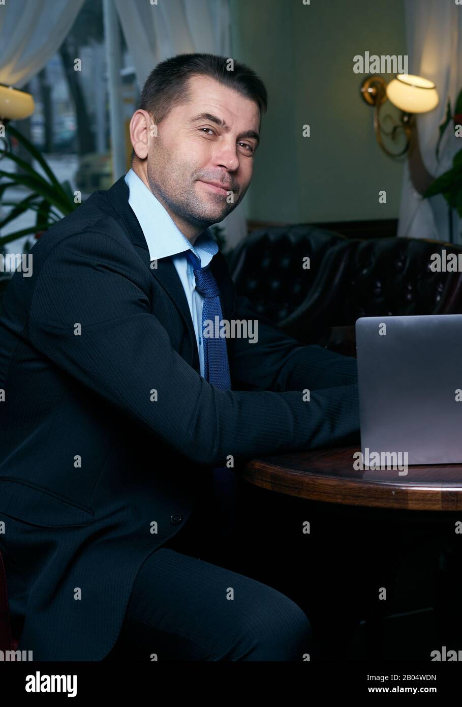 business man working with documents and laptop Stock Photo