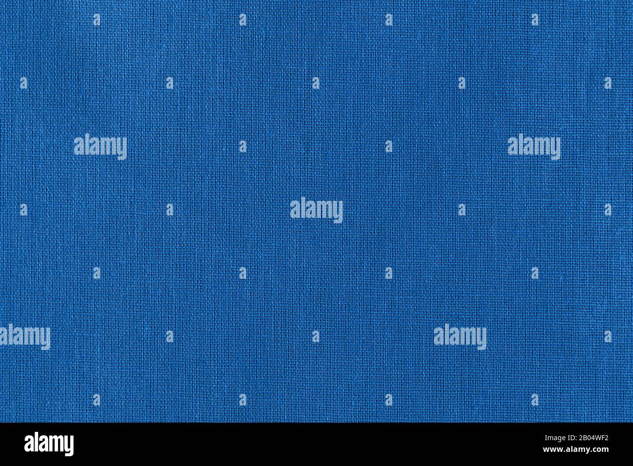 Flat lay a classic blue fabric. Abstract modern trendy cloth texture background Stock Photo
