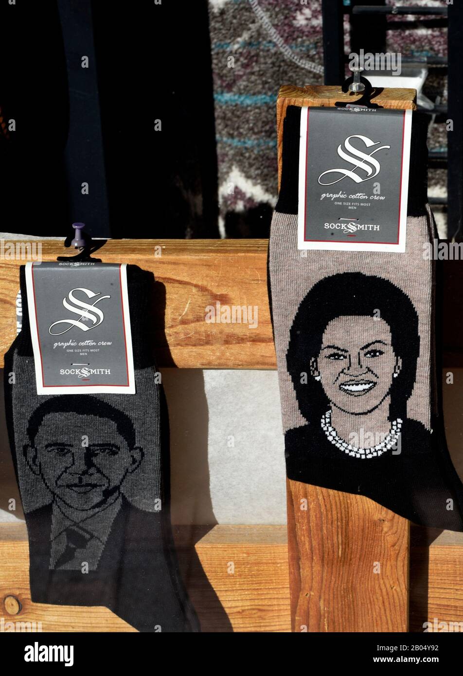 Pairs of Socksmith brand novelty socks for sale in Santa Fe, New Mexico, feature portraits of Barack Obama and Michelle Obama Stock Photo