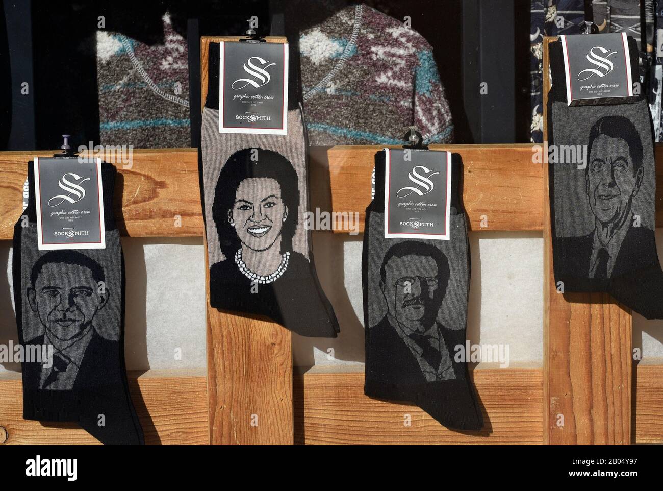 Pairs of Socksmith brand novelty socks for sale in Santa Fe, New Mexico, feature portraits of Barack Obama and Michelle Obama Stock Photo