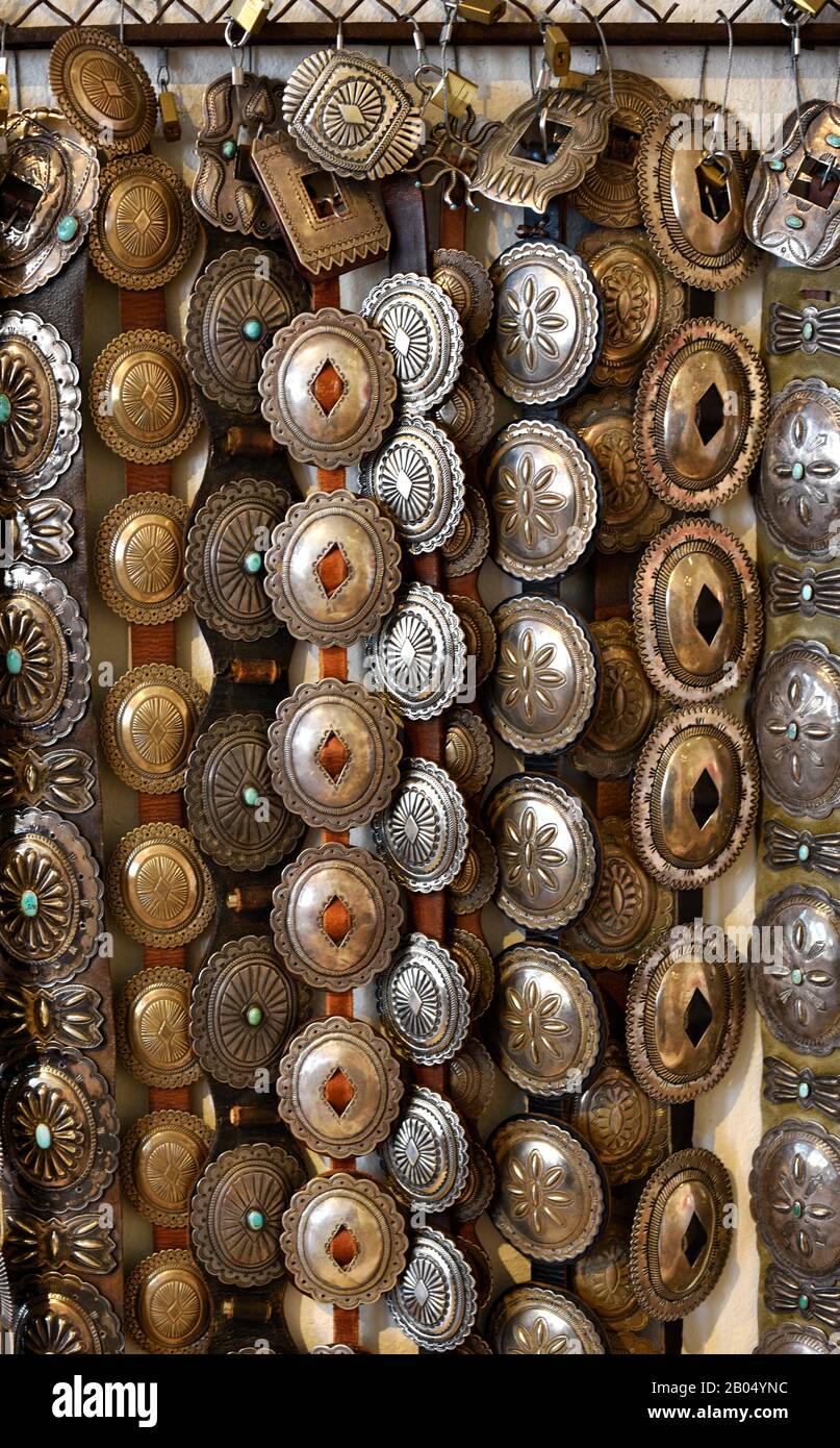 A selection of Native American silver concho belts for sale in a shop in  Santa Fe, New Mexico Stock Photo - Alamy