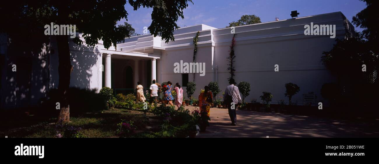 Rear view of tourists entering into a museum, Indira Gandhi Memorial Museum, New Delhi, India Stock Photo