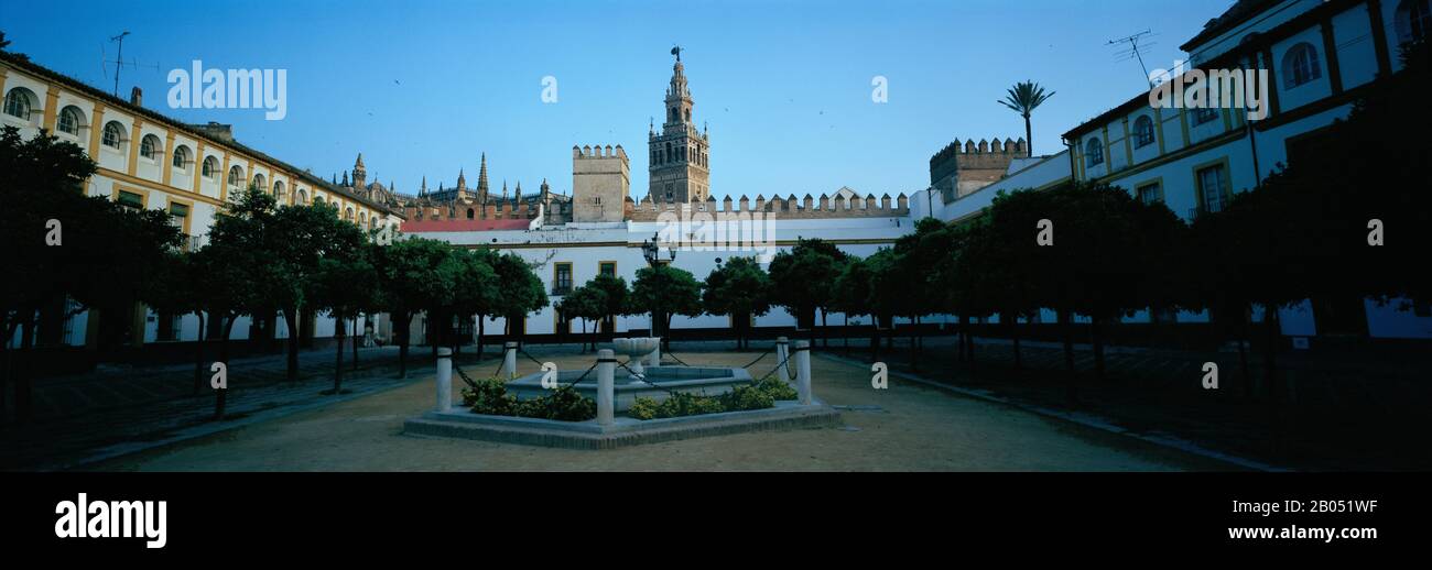 Fountain in a garden, Patio De Banderas, Alcazar Palace, La Giralda, Seville Cathedral, Seville, Seville Province, Andalusia, Spain Stock Photo