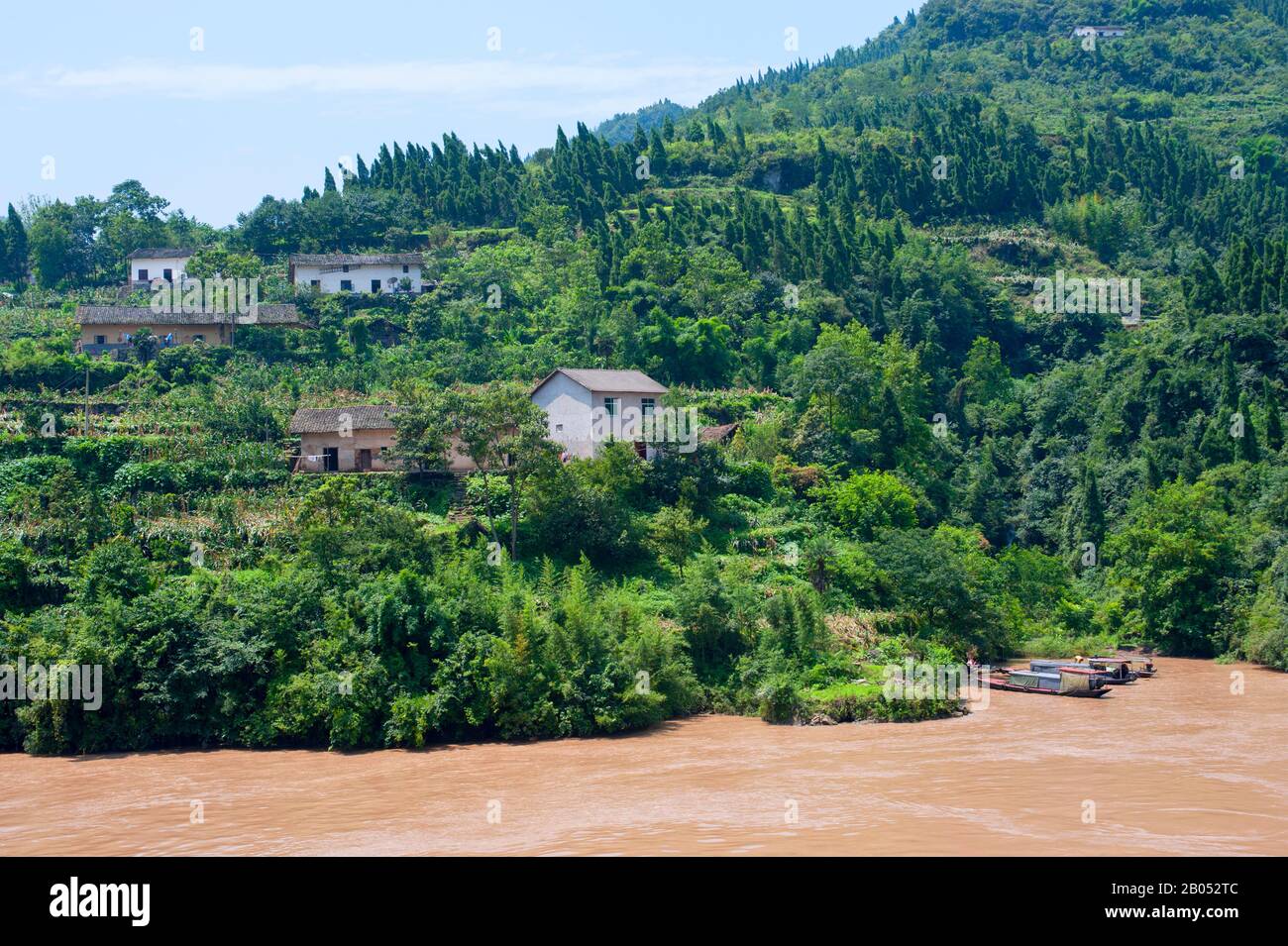 A village along the Yangtze River at Xiling Gorge in the Three Gorges ...