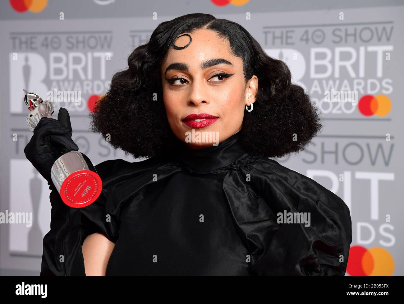 Celeste with the Brits Rising Star Award in the press room at the Brit