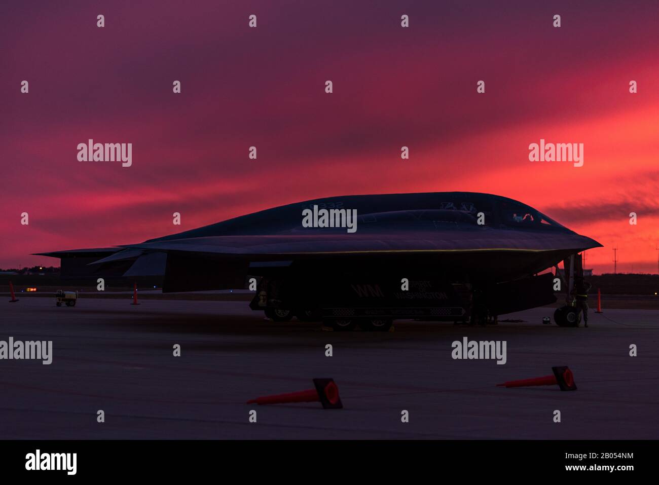A U.S. Air Force B-2 Spirit stealth strategic bomber with the 509th Bomb Wing taxis silhouetted against the setting sun on the flight line at Whiteman Air Force Base October 29, 2019 in St Louis, Missouri. Stock Photo