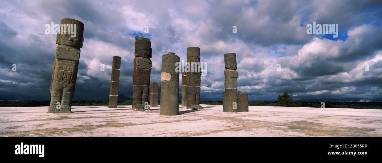 Low angle view of clouds over statues, Atlantes Statues, Temple of Quetzalcoatl, Tula, Hidalgo State, Mexico Stock Photo