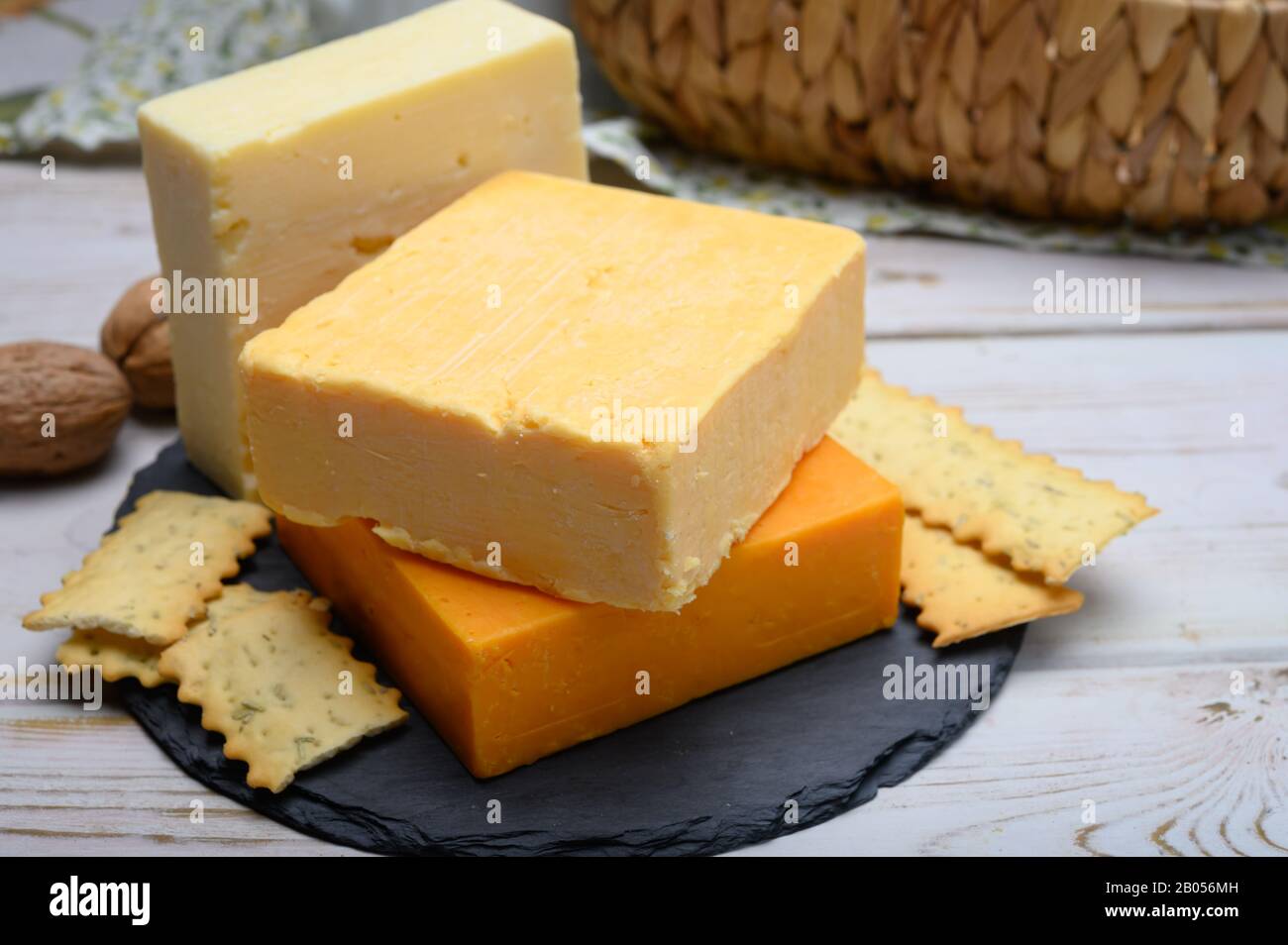Leicestershire cheese or red leicester and mature cheddar, variety of British hard cheeses made