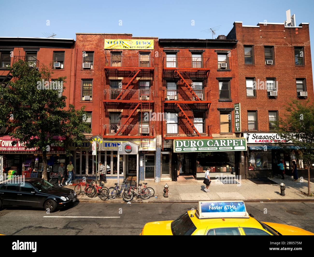 Stores at the roadside, First Avenue, 20th Street, Stuyvesant Town, Manhattan, New York City, New York State, USA Stock Photo