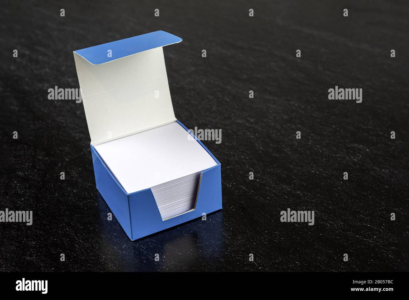 Download Blue Box Of White Memo Papers On Dark Background Mock Up Office Note Papers Stock Photo Alamy PSD Mockup Templates
