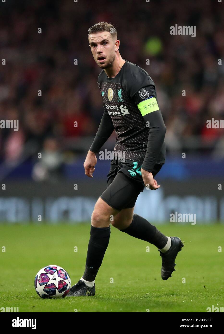 Liverpool's Jordan Henderson during the UEFA Champions League round of 16 first leg match at Wanda Metropolitano, Madrid. Stock Photo