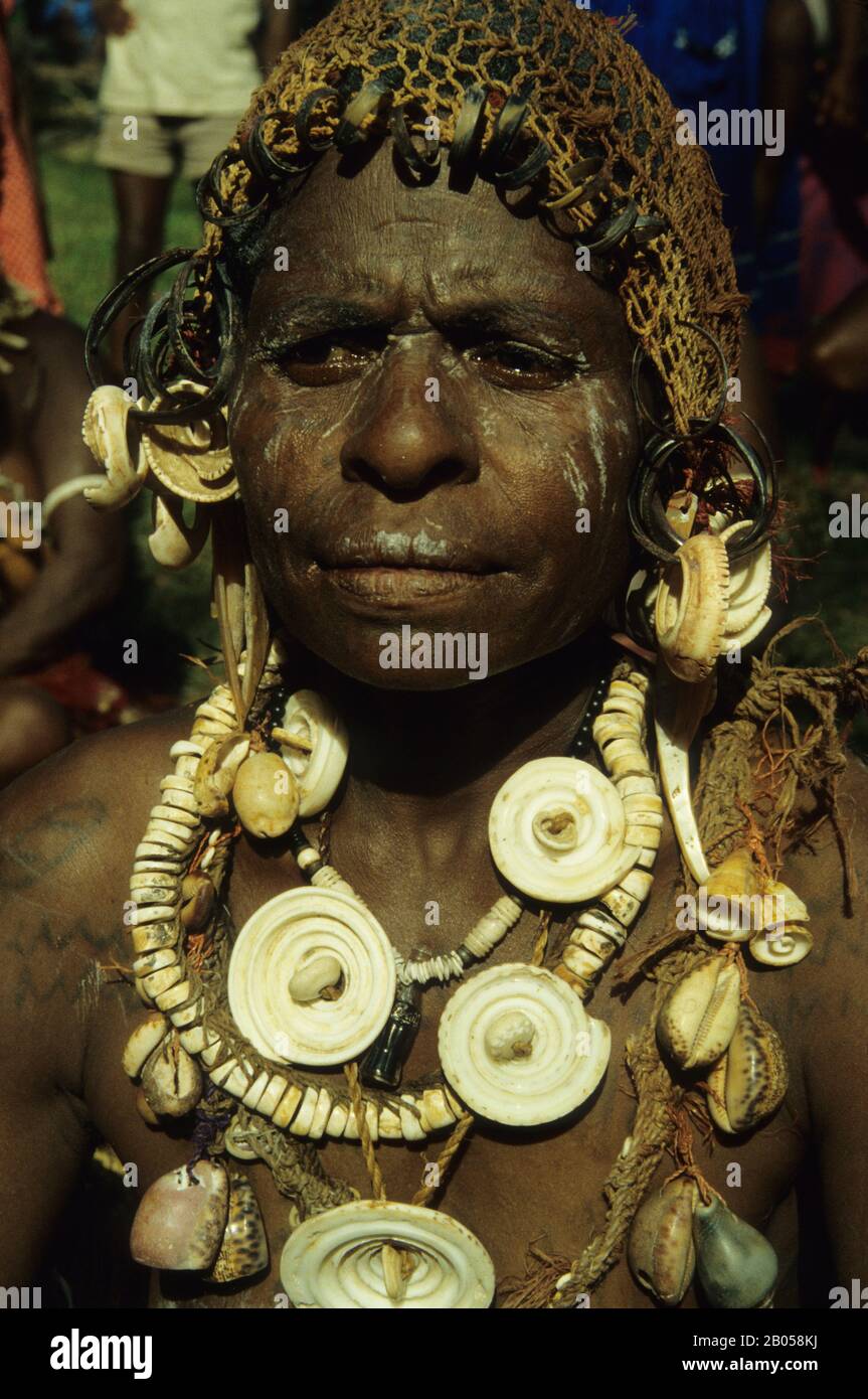 PAPUA NEW GUINEA, SEPIK RIVER, PORTRAIT OF WOMAN WITH SHELL NECKLACES Stock Photo