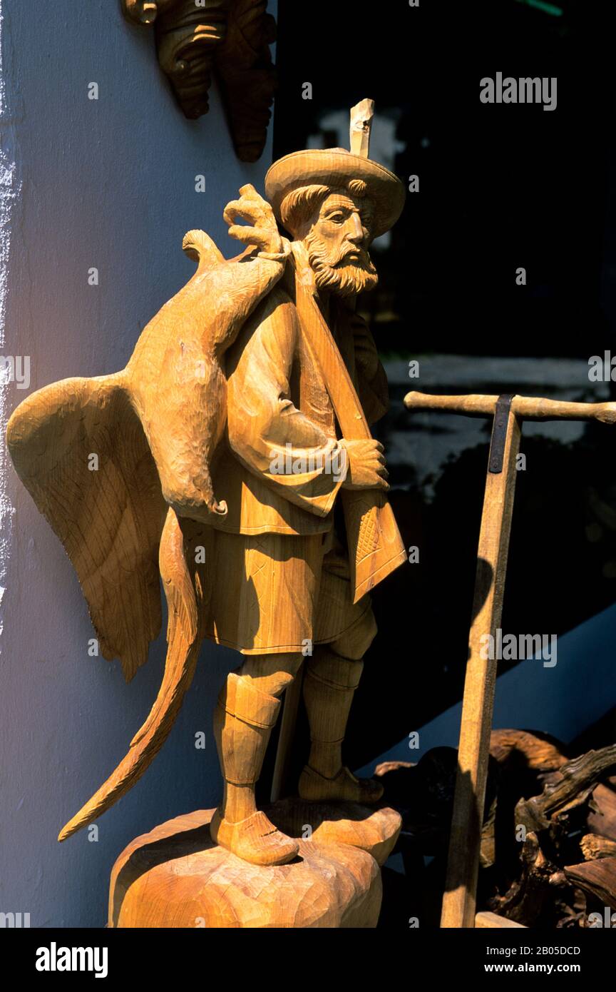 GERMANY, BAVARIA, OBERAMMERGAU, WOOD CARVING, STATUE OF HUNTER Stock Photo Alamy