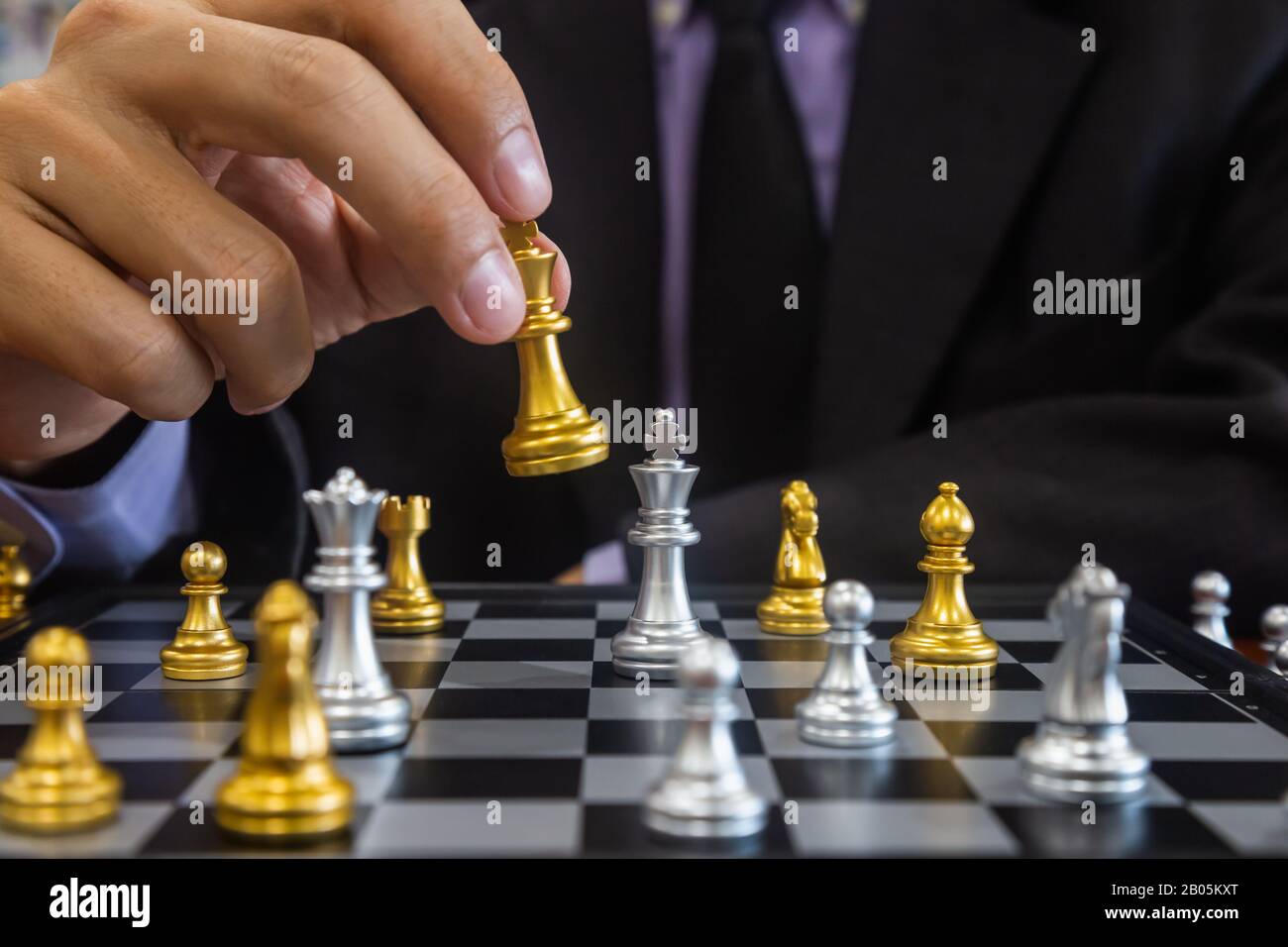 Businessman Playing Chess Board Game For Development Analysis New Strategy  Planningthe Battle Of Competition And Strategy Ideas With Market Mechanism  Stock Photo - Download Image Now - iStock