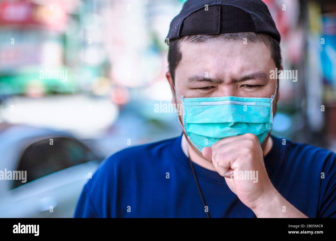 Asian man wear medical mask on the street Stock Photo Alamy