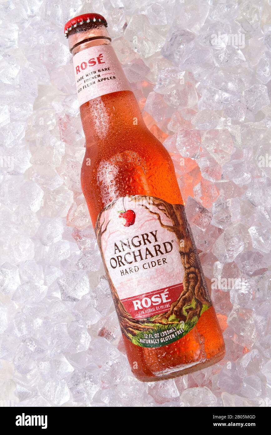 IRVINE, CALIFORNIA - OCTOBER 19, 2018: Anrgy Orchard Rose  Hard Cider on ice, made from rare French Red Flesh Apples. Stock Photo