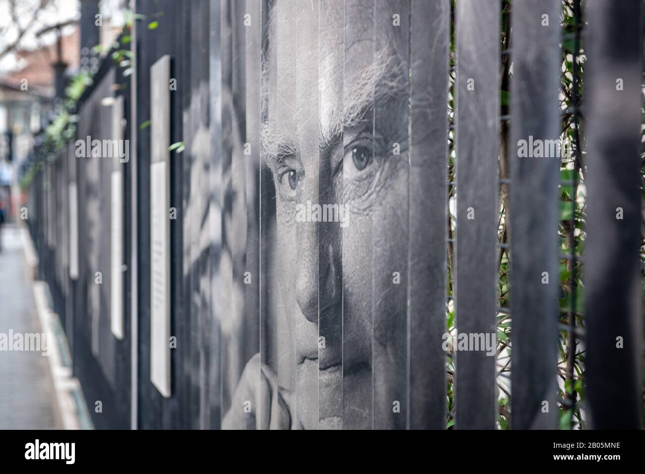 Optical illusion artwork of famous scientists displayed at two