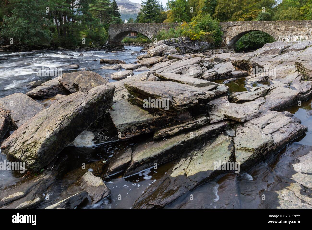 Beautiful Dochart falls in Killin Scotland with lots of rocks and low ...