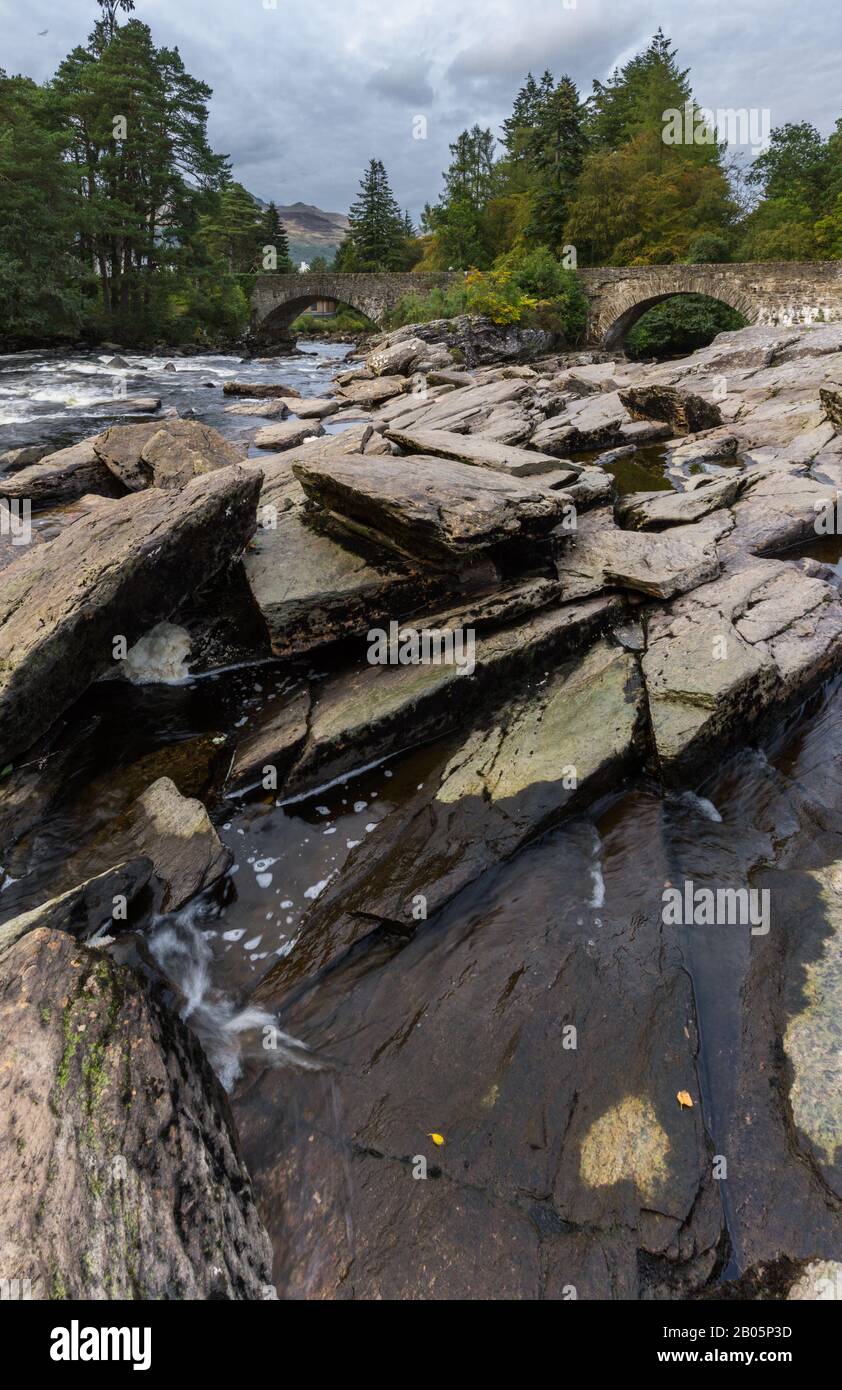 Beautiful Dochart falls in Killin Scotland with lots of rocks and low ...