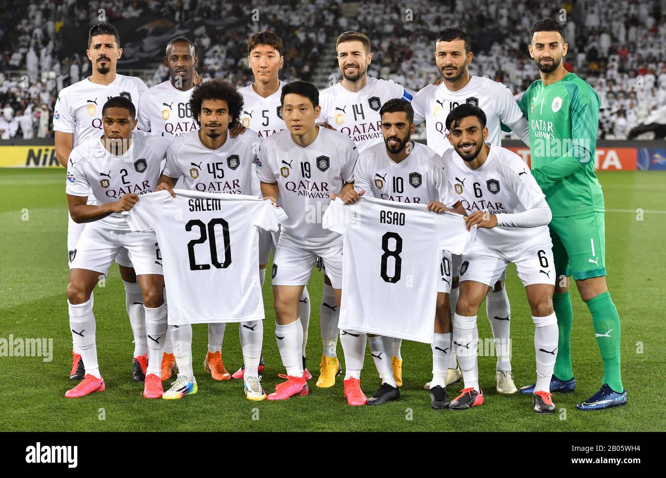 Doha, Qatar. 18th Feb, 2020. Starting players of Al Sadd pose for photos  prior to the AFC Asian Champions League group D football match between  Qatar's Al Sadd SC and Iran's Sepahan