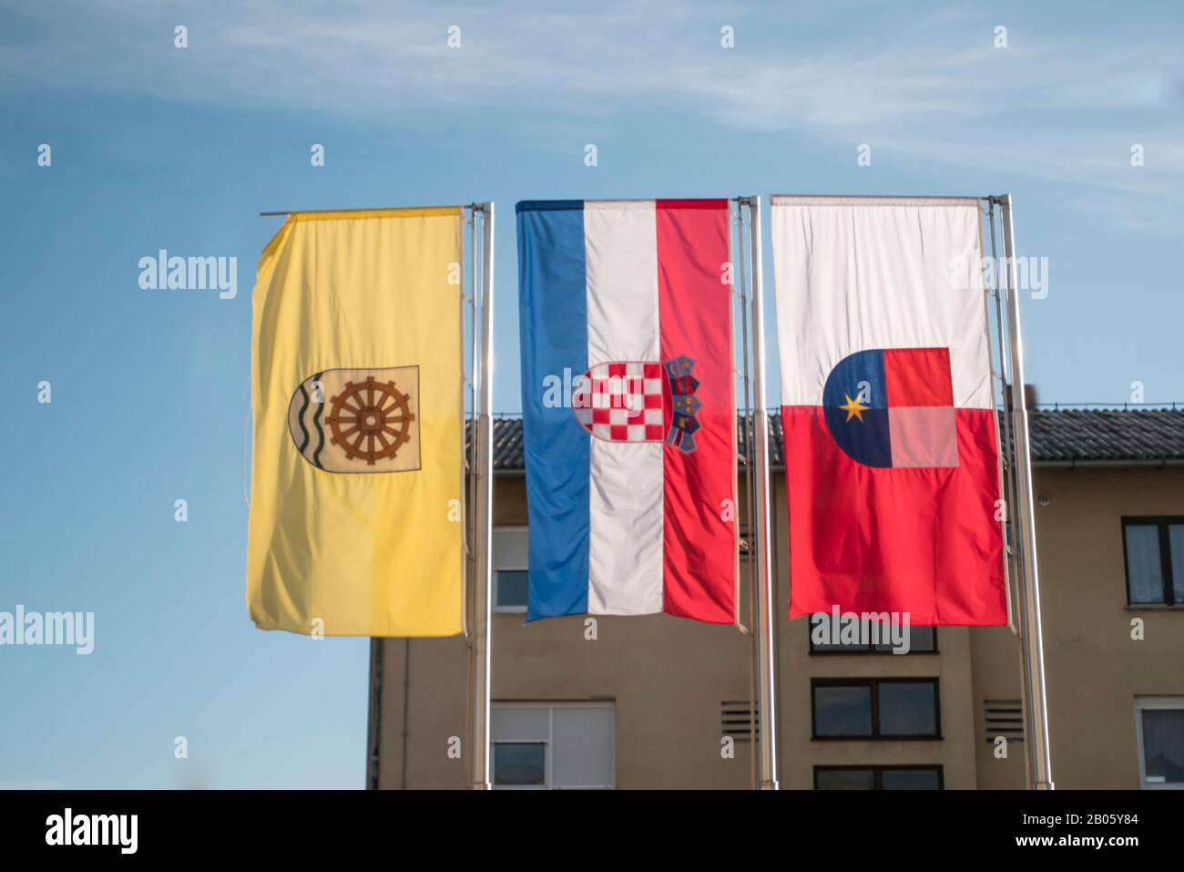 Flags on the mast in the town of Podturen. The flags are from the city of Podturen, the Croatian state and the county of Medimurje. World wetlands day Stock Photo