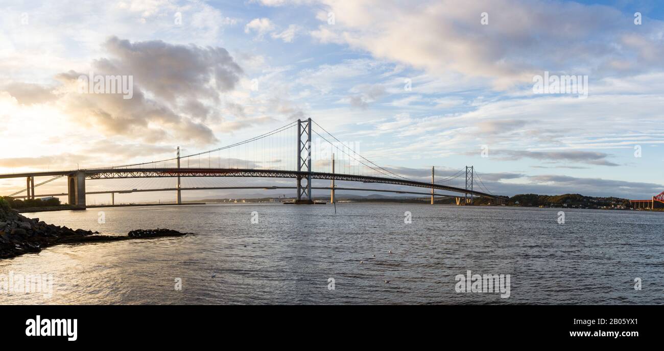 South Queensferry, Scotland  - September 16 2019: Afternoon view of the two newest of the Forth Bridges from South Queensferry, UK September 16,  2019 Stock Photo