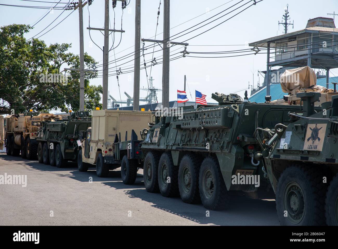 Soldiers from 2nd Infantry Brigade Combat Team, 25th Infantry Division, prepare military equipment and vehicles Feb. 17, 2020, at Chuk Samet, Thailand. Over 700 vehicles, containers and pieces of equipment were offloaded from Maritime Sealift Command M/V Cape Hudson (T-AKR 5066) in support of exercise Cobra Gold 20 and movements aligning with U.S. Army Pacific's program, 'Pacific Pathways,' in explaining Army's engagement in the Pacific region. Stock Photo