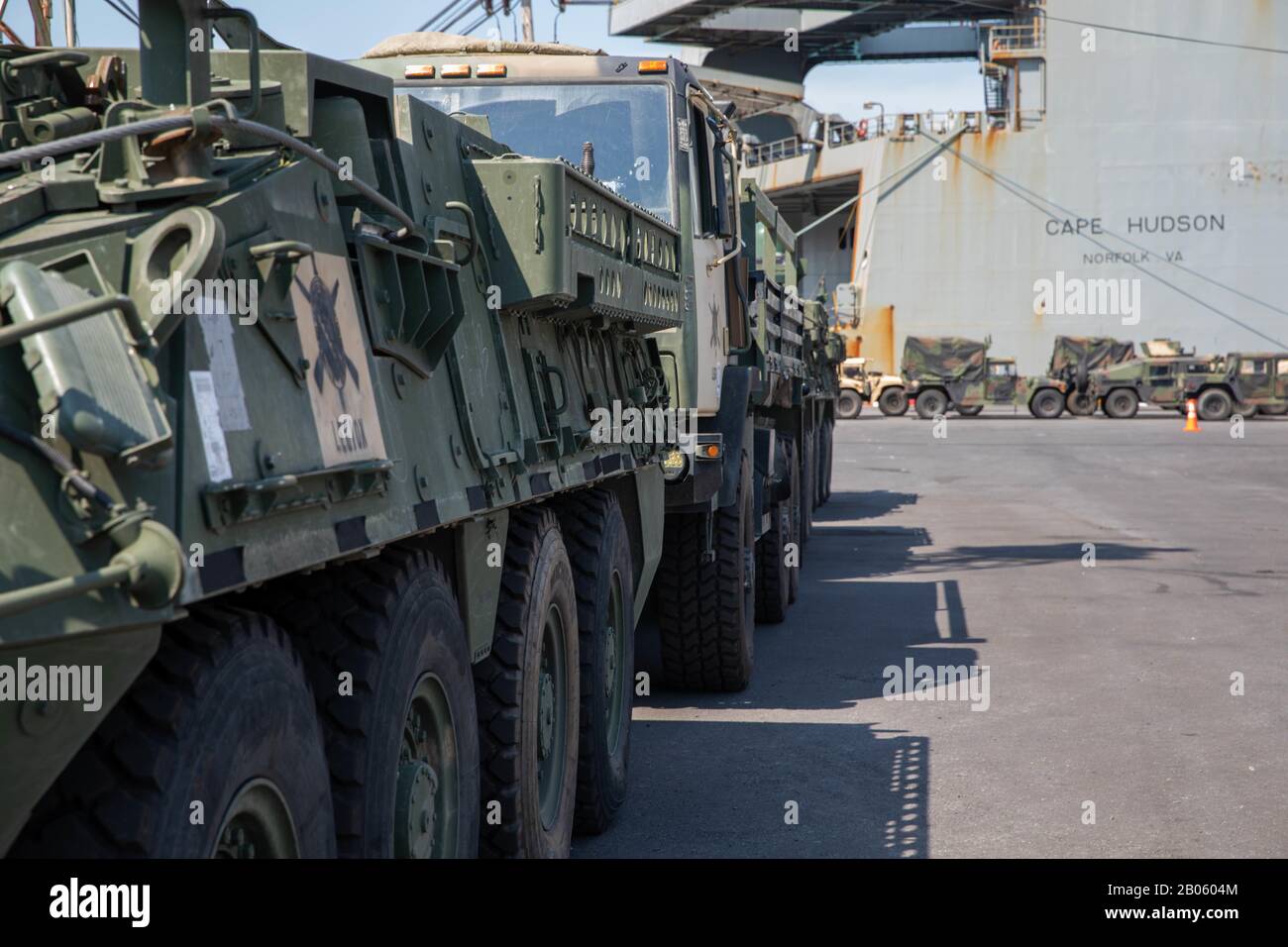 Soldiers from 2nd Infantry Brigade Combat Team, 25th Infantry Division, prepare military equipment and vehicles Feb. 17, 2020, at Chuk Samet, Thailand. Over 700 vehicles, containers and pieces of equipment were offloaded from Maritime Sealift Command M/V Cape Hudson (T-AKR 5066) in support of exercise Cobra Gold 20 and movements aligning with U.S. Army Pacific's program, 'Pacific Pathways,' in explaining Army's engagement in the Pacific region. Stock Photo