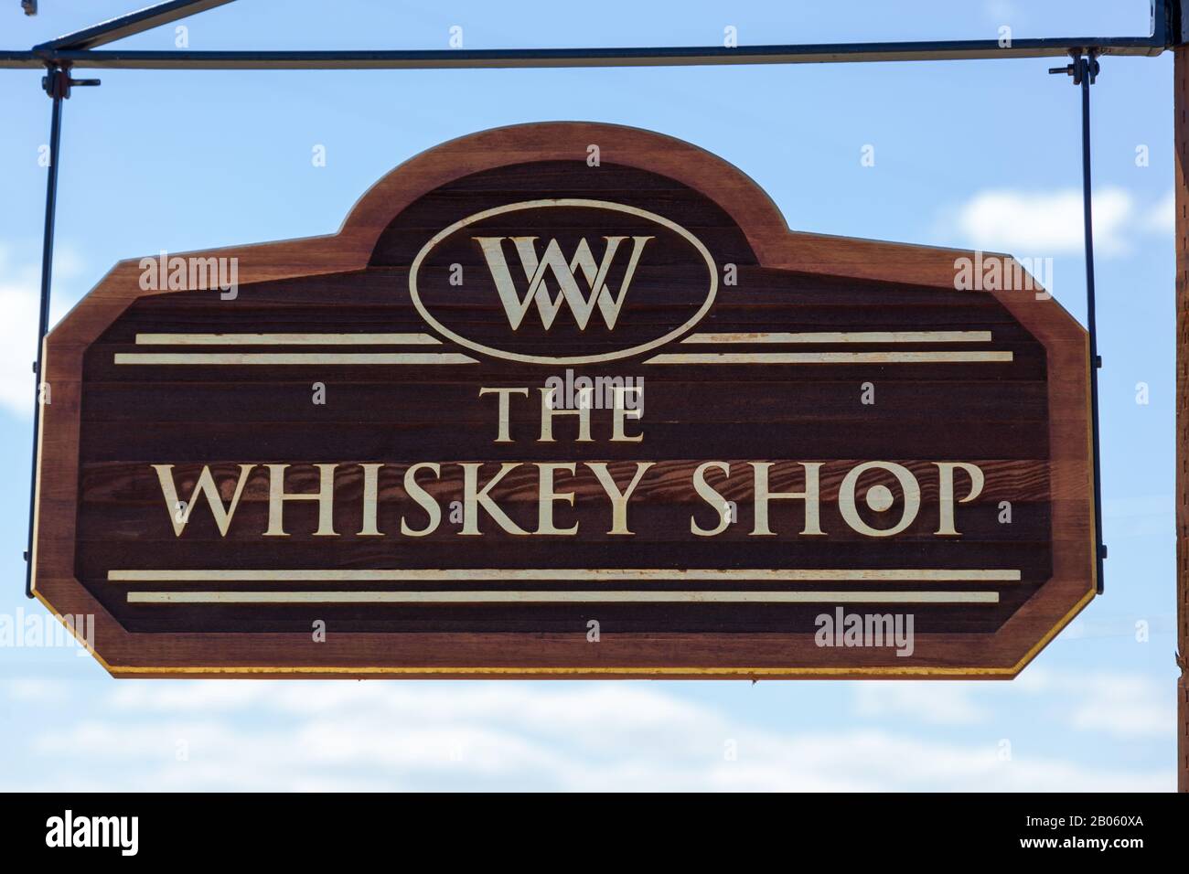 KIRBY, WYOMING July 7, 2014 A hanging wooden sign at Wyoming Whiskey