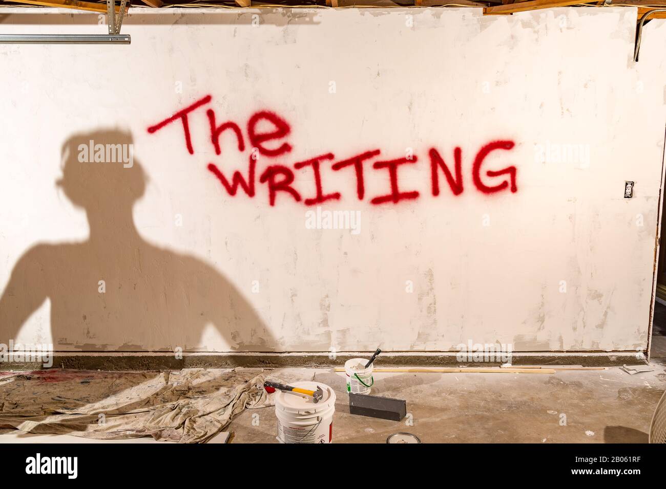 The Writing on the Wall in Red Stock Photo - Alamy