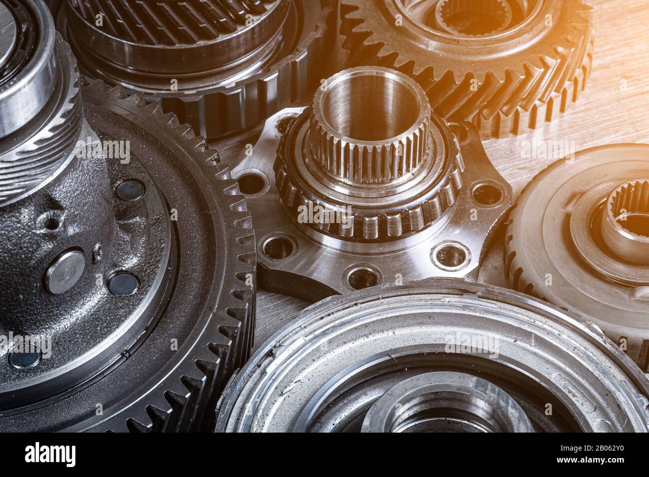 Set of various engine and gearbox spare parts. Shiny gears for