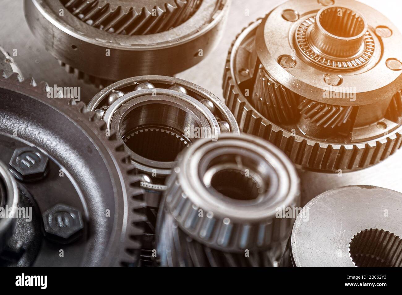 Set of various engine and gearbox spare parts. Shiny gears for