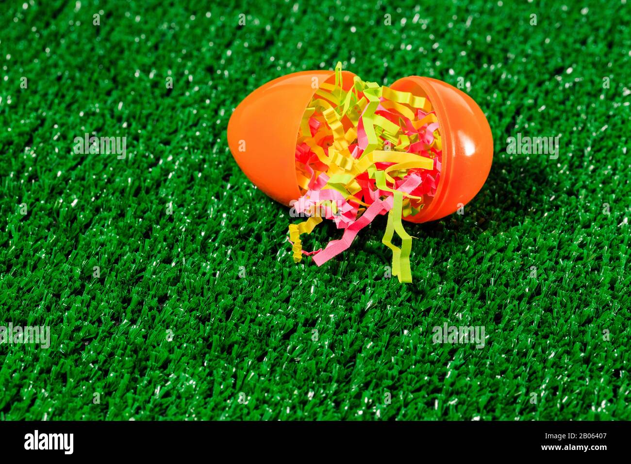 Colorful Easter Eggs on Grass or Artificial Turf Stock Photo