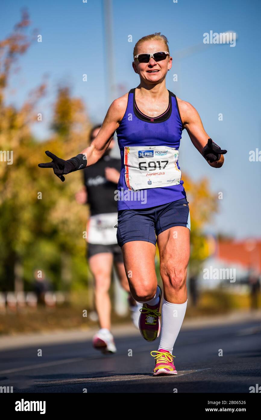 Marathon in Poznan, Poland. Colorful people, pop culture characters, 16.  PKO Poznan Maraton.Filled with joy, happy people running on the sunny  street Stock Photo - Alamy