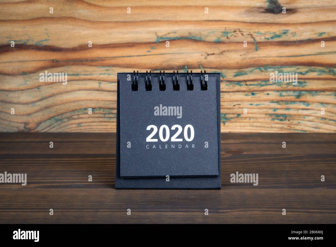 2020 Black paper calendar on a wooden table Time planning day 2020 Black paper calendar on a wooden table Time planning day