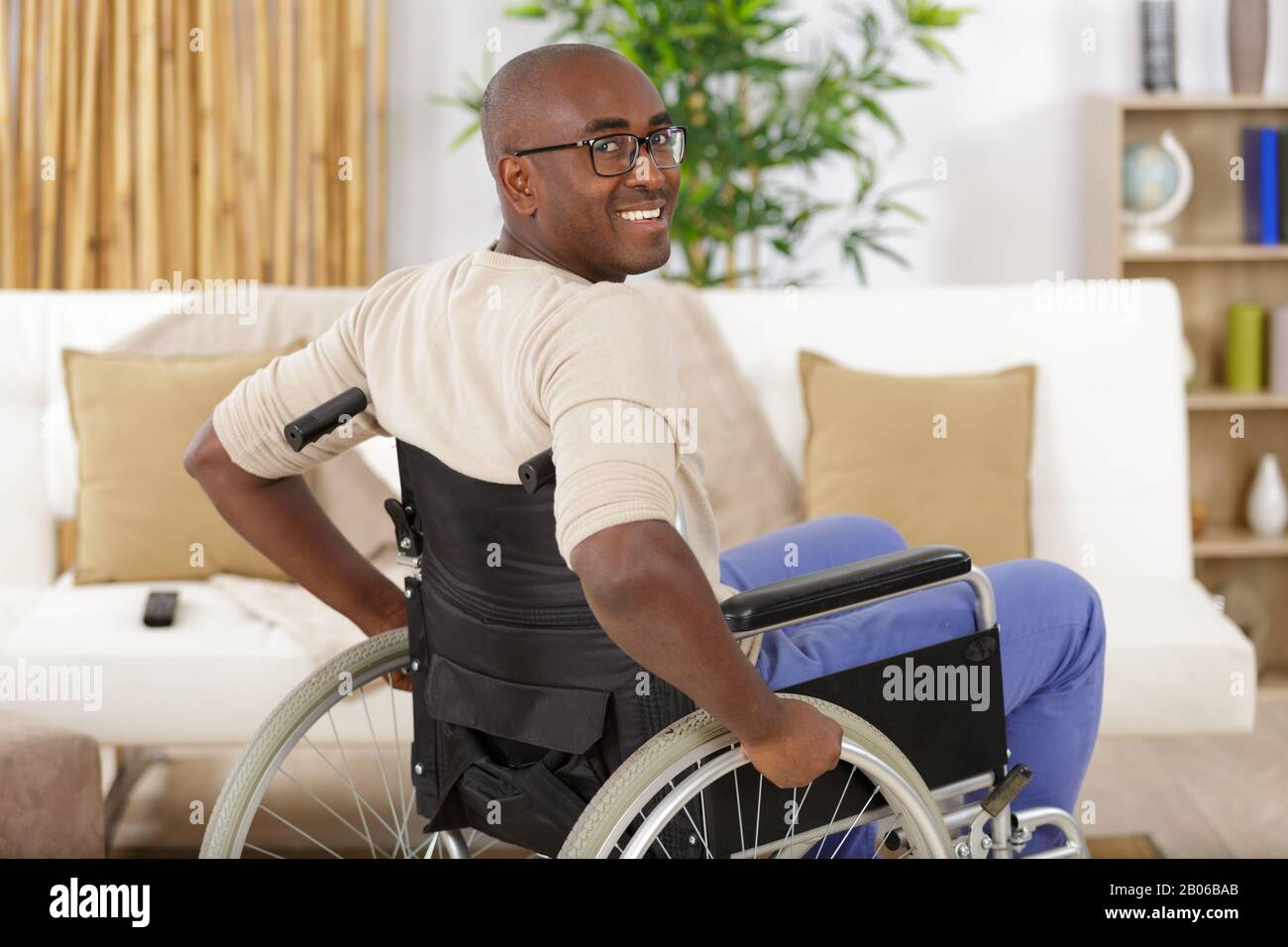 heerful smart man in wheelchair Stock Photo Alamy