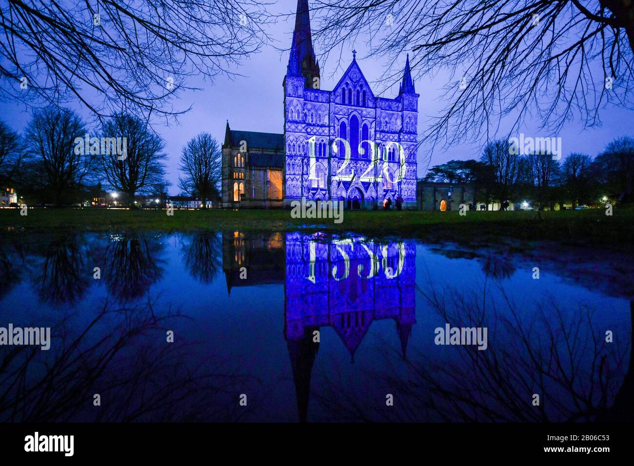 Light projections cover the West Front of Salisbury Cathedral, where a light and sound art installation, titled Sarum Lights, is marking the Cathedral's 800th anniversary in 2020, by lighting the inside and outside along with music. Stock Photo