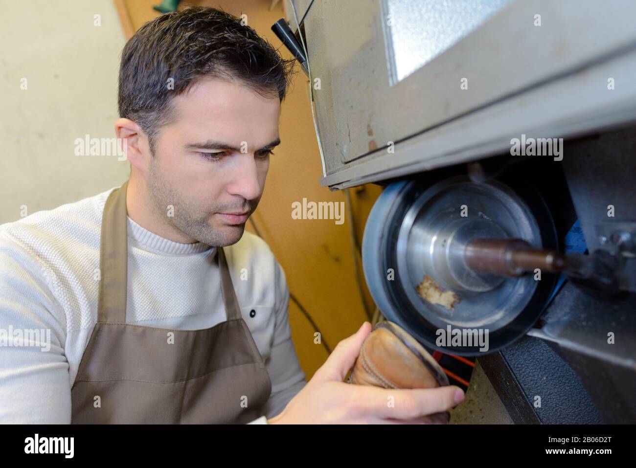 craftsman shoemaker working Stock Photo Alamy