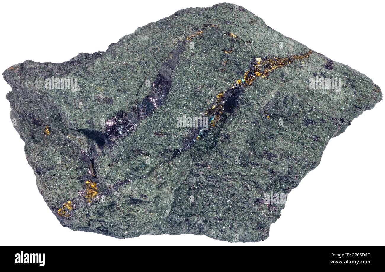 Kostovite, Bulgaria  Kostovite is a rare telluride mineral containing copper and gold. Kostovite forms small grains and short veinlets in tennantite a Stock Photo